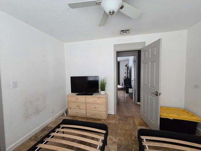 Building Photo - Furnished, 1-Year Long-Term Rental