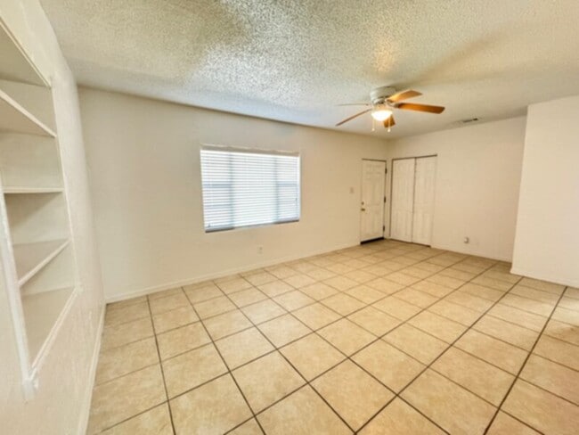 Building Photo - 4 Bedroom, 2 Bath House with Huge Fenced Yard, ALL Tile Floors!