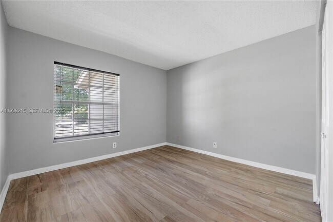 Building Photo - 5850 NW 57th Ave