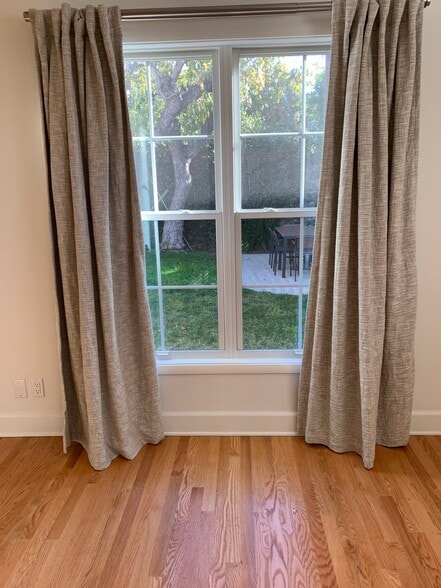 View of Yard from Primary Bedroom - 848 N Kilkea Dr