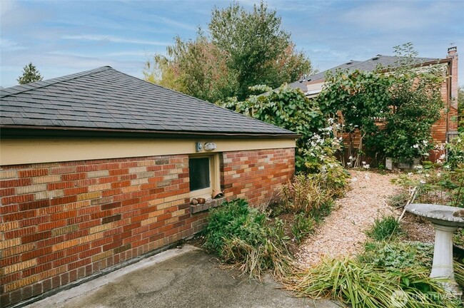 Building Photo - Charming 1940s Classic Brick Home