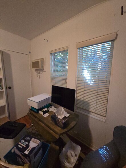 Front Main Bedroom with windows overlooking the front of the building - 430 S Oakhurst Dr