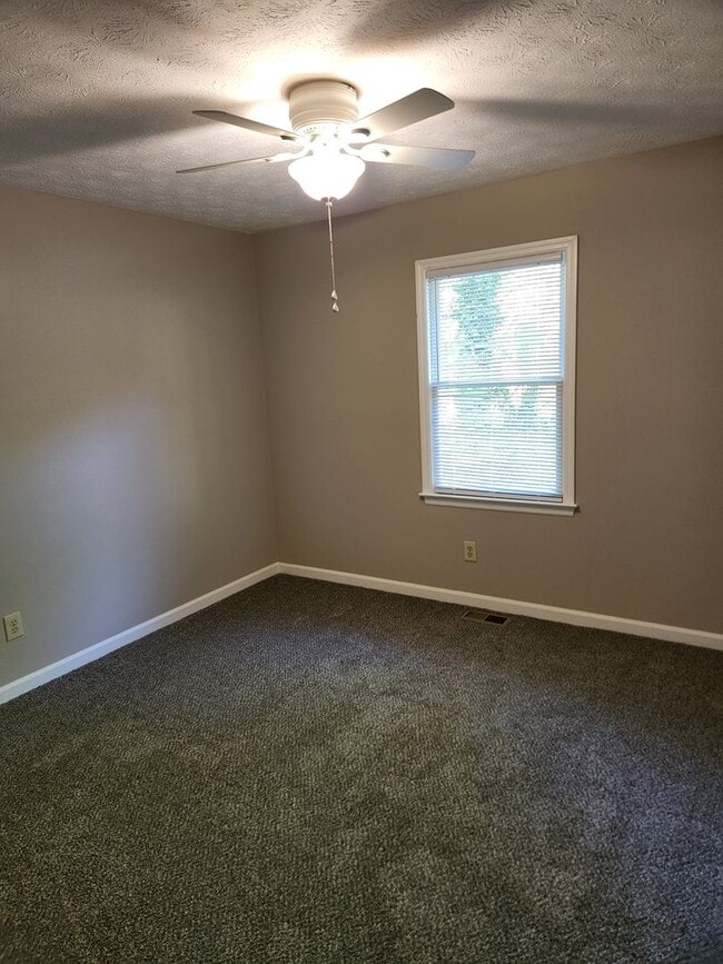 Building Photo - The Best of North Metro Living without the...