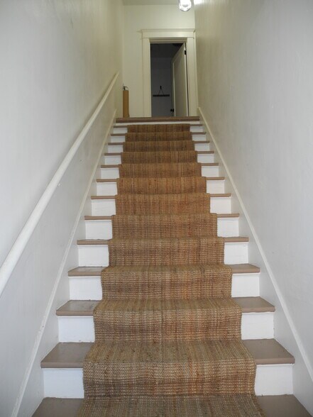 Staircase leading to unit - 1934 Henderson Ave