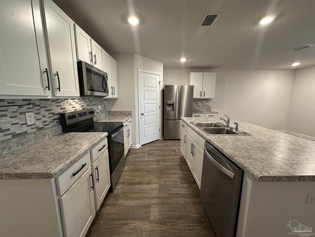 Building Photo - 7565 Steeplechase Blvd