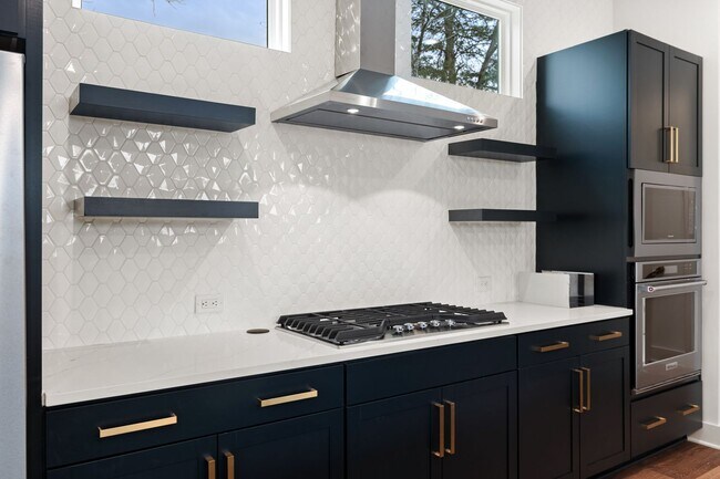 Building Photo - Modern 4-bedroom, 4-bathroom Home in Durham, NC