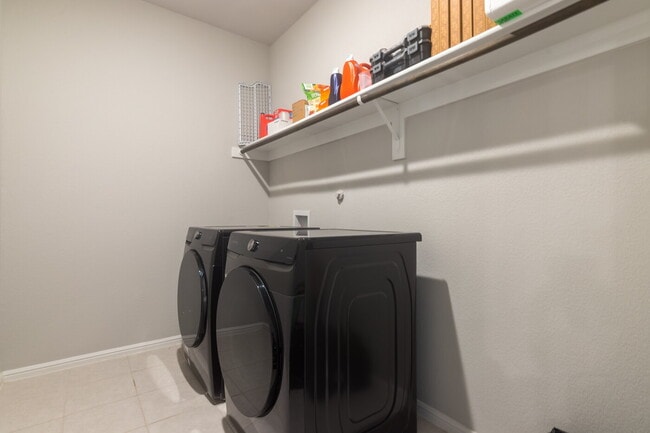 Building Photo - Gorgeous Two Story Home Featuring 2 Living spaces, 5 Bedrooms, and 3.5 Baths