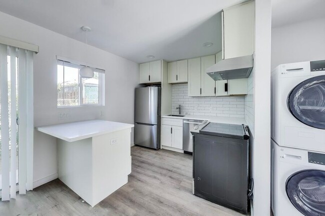 Building Photo - BRAND NEW 2 BEDROOM w/ Patio + W/D in unit