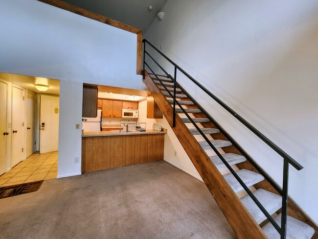 Kitchen, Entryway, & Stairs to Loft - 4896 S Dudley St