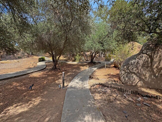 Building Photo - Hilltop Retreat with Pool, Garden & Panora...