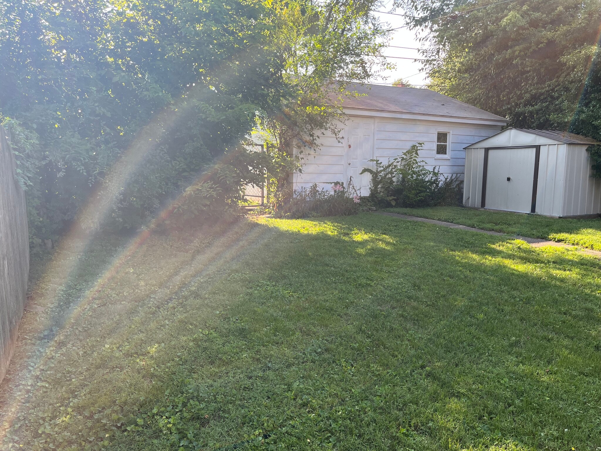 Back yard with shed. Garage not include.d - 1445 South Center Street