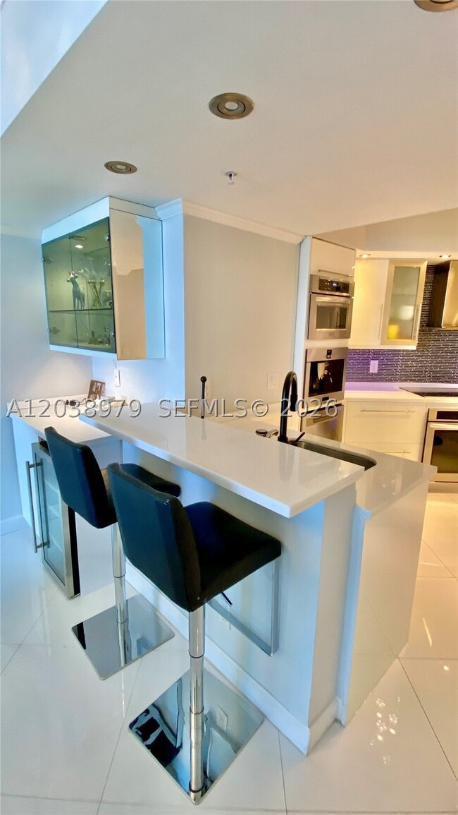 Building Photo - 16699 Collins Ave