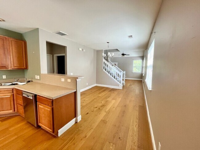 Building Photo - Spacious Move In Ready Townhome on Johns I...