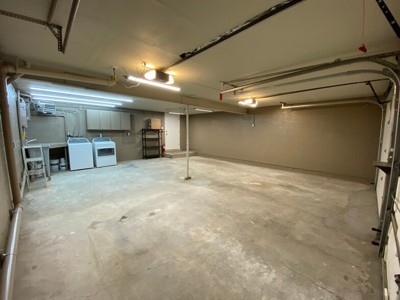Laundry with cabinet and chute - 103 Onyx St