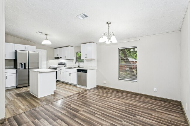 Building Photo - 223 Ajax Dr NW