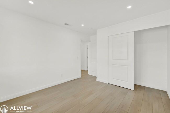 Building Photo - Fully Renovated 4-Bedroom Home with Firepl...