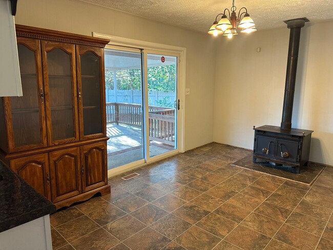 Building Photo - 4 Bedroom 1 1/2 Bath for Rent W/ Converted...