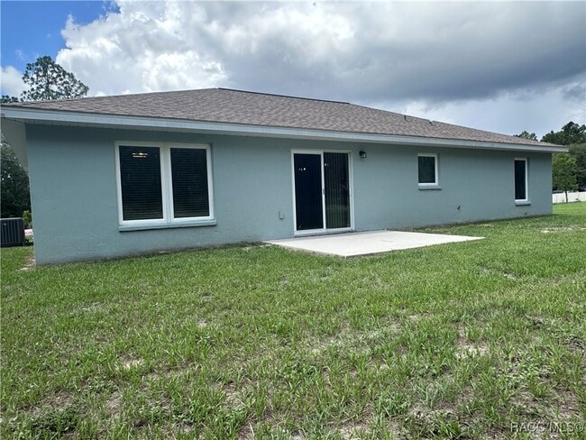 Building Photo - 7779 N Triana Dr