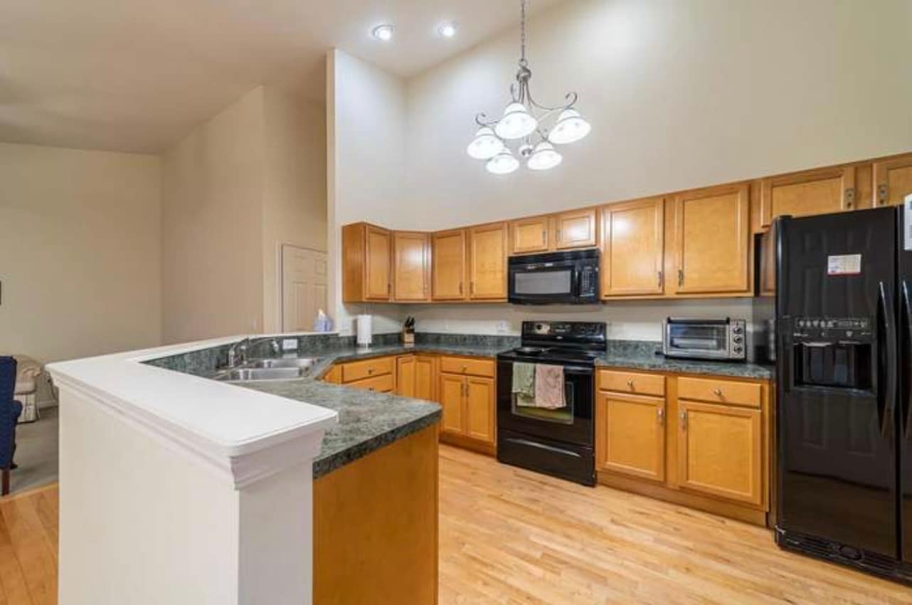 Kitchen photo with old flooring, Sink and Faucet! It is updated! - 3524 Durham Ln