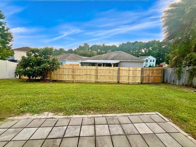 Building Photo - 3/2 with flex room & Fenced in yard