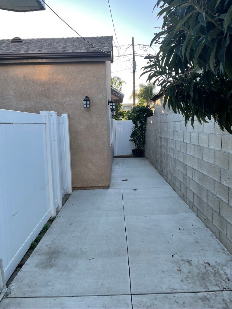 walkway to front door - 6227 Atoll Ave