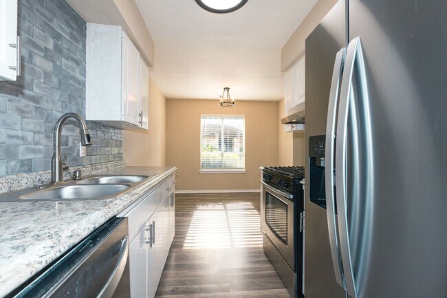 Building Photo - East 33rd Ct Duplex