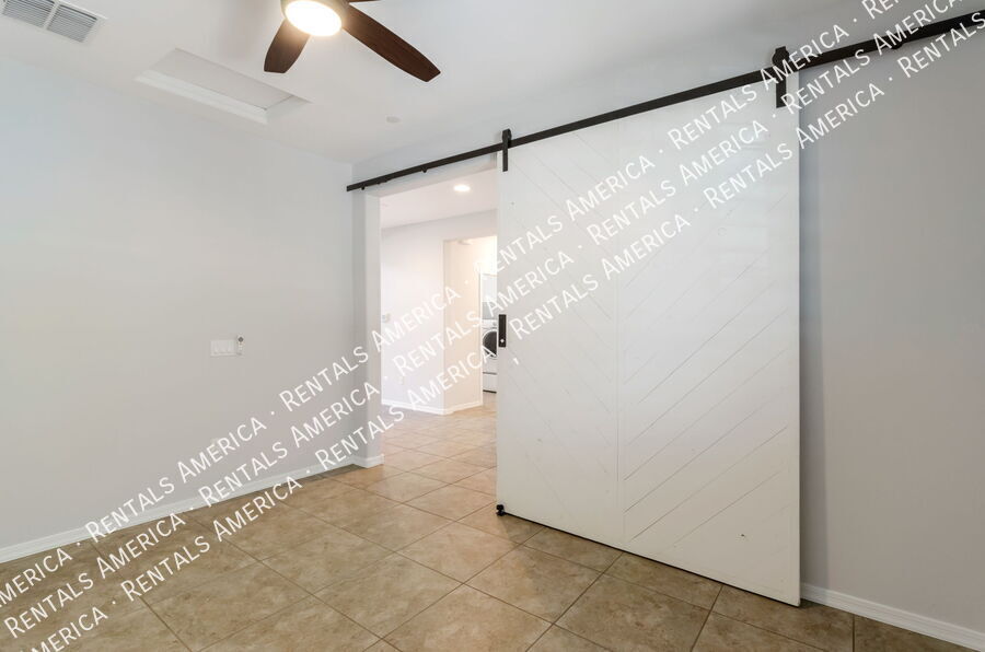 Building Photo - 5768 S Tiger Lily Pl