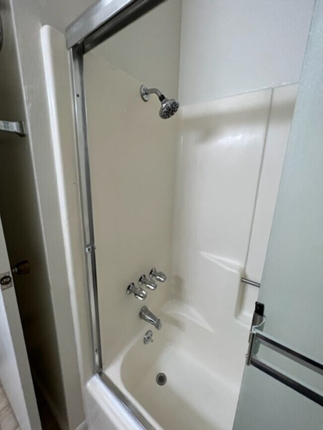 Building Photo - Spacious Condo with Private Patio