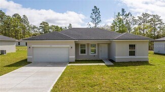 Building Photo - 9825 N Swanee Terrace