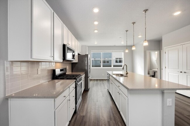 Building Photo - Gorgeous NEW Three Story Townhome with two car attached garage!