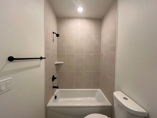 Building Photo - Modern 2-Bed, 1.5-Bath Condo with Custom K...