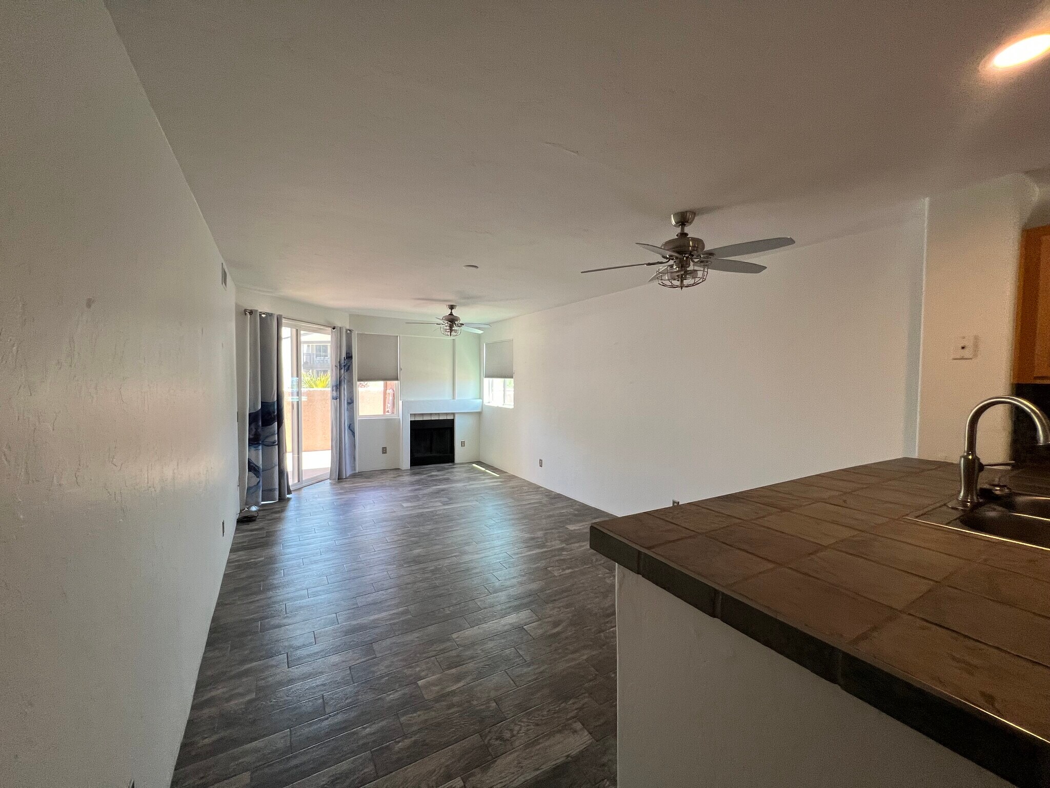 Living room opens to patio - 5675 N Camino Esplendora