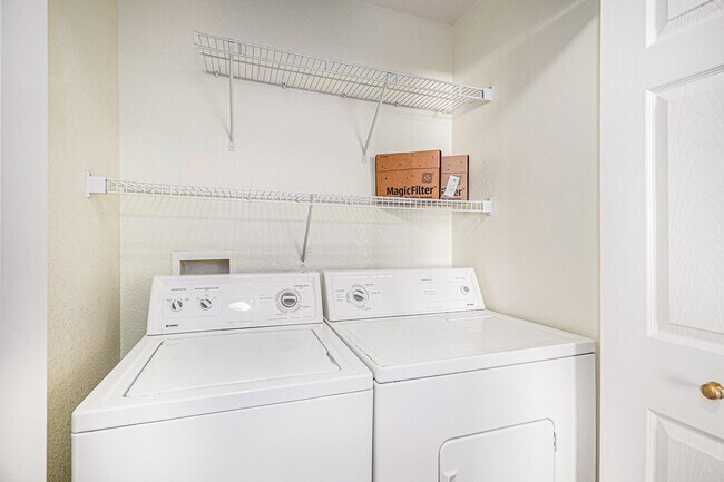 Building Photo - Bright 2-Bedroom Condo with Private Patio & Resort-Style Amenities!