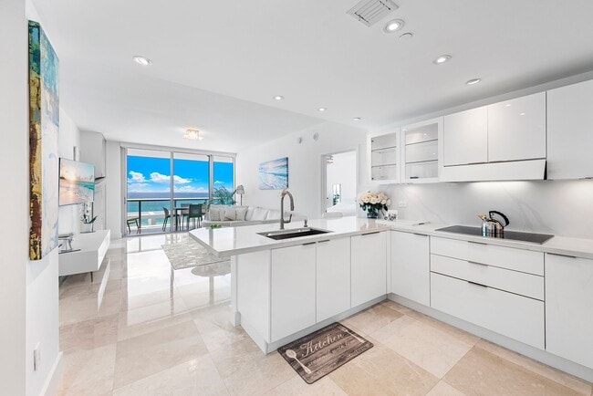 Building Photo - 6799 Collins Ave