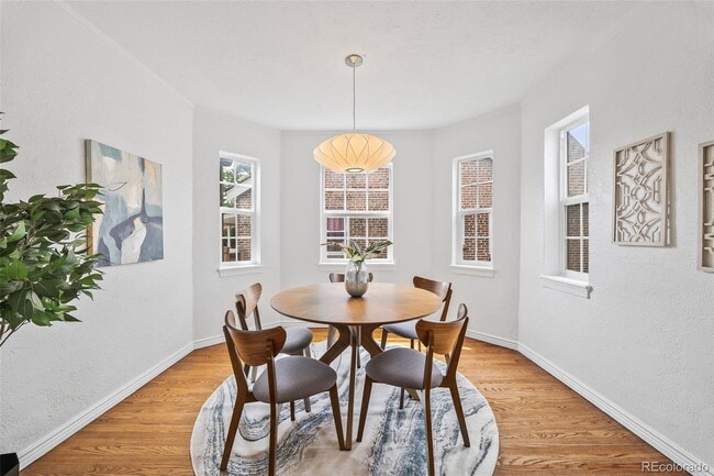 Building Photo - "Spacious 5-Bedroom Gem with Hardwood Floors & Cozy Fireplace in Denver's Heart!"