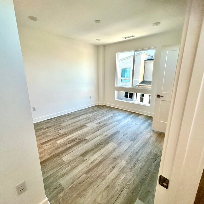 Building Photo - Brand New Townhome with Solar - 2 Bedroom/2.5 Bath