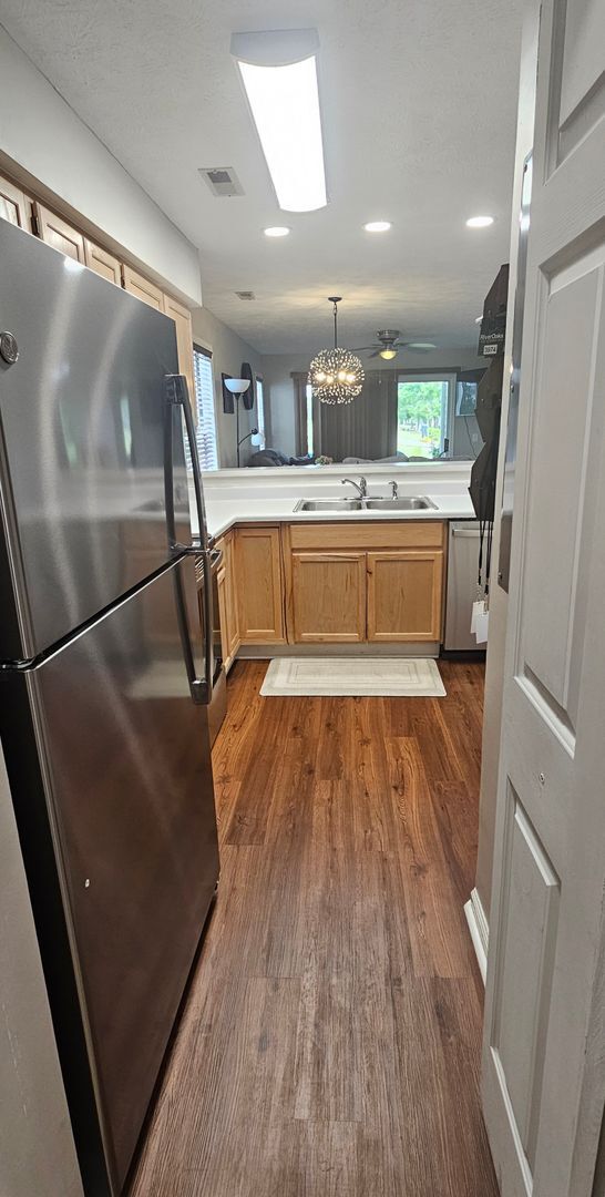 Building Photo - -First-Floor End-Unit | Fully Furnished 2B...