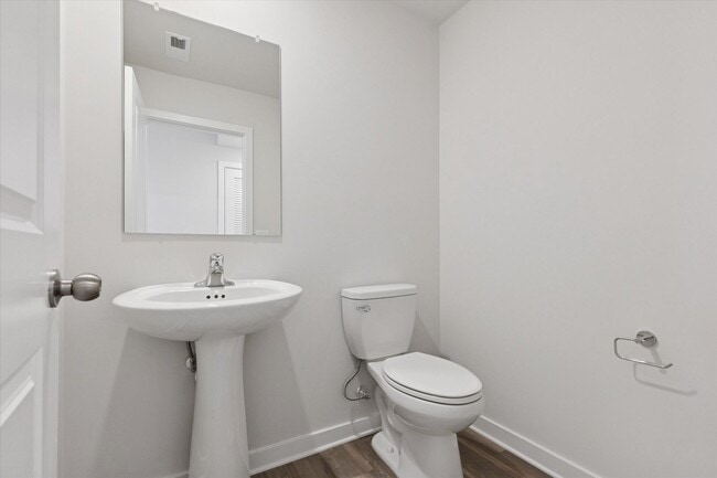 Building Photo - COMING SOON! Brand New River Pointe townhome with modern finishes, flexible living space, and a p...