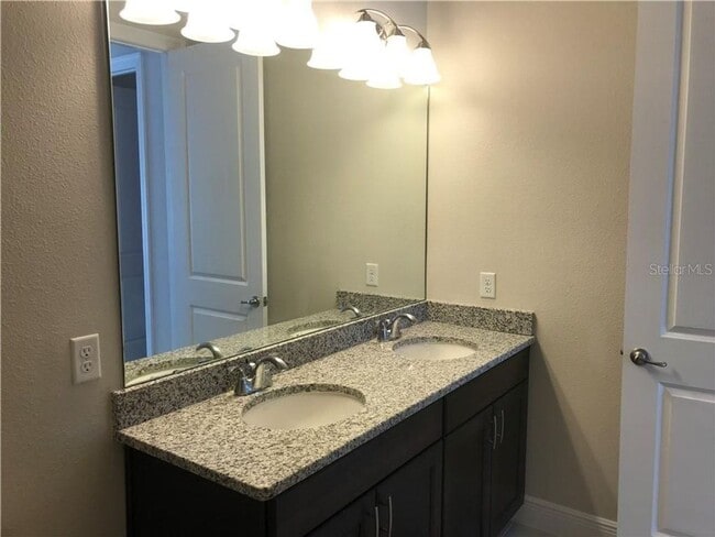 Building Photo - 8896 Bismarck Palm Dr