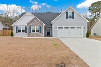 Building Photo - Minutes to Back Gate & Beaches!