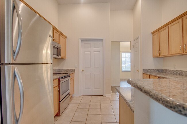 Building Photo - Updated 4BR/3BA Brick Home Near NAS Pensacola with Office & Screened Porch
