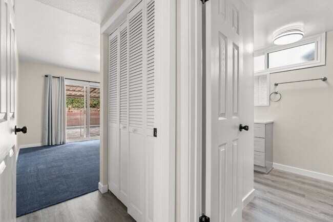 Building Photo - Charming Updated Home With Drive-Through Garage Access