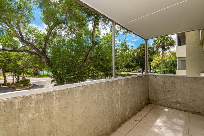 Building Photo - 6075 N Sabal Palm Blvd