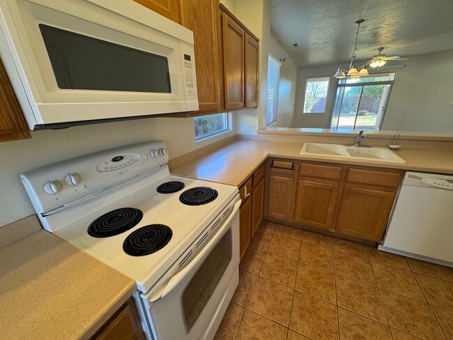 Building Photo - Coral Canyon Gem with NEW CARPET & TWO CAR...