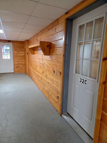 outside apartment hallway entrance - 32 Stagecoach Rd
