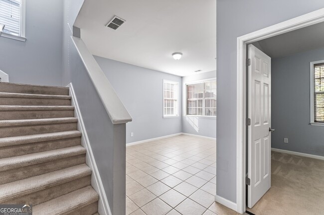 Building Photo - 4674 Creekside Villas Way