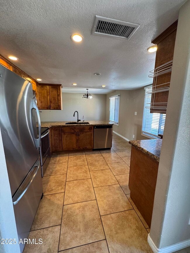 Building Photo - 3753 E Charter Oak Rd