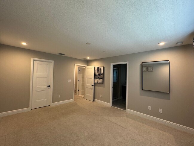 Building Photo - Elegant living in a vibrant, strategically located community—your perfect place to call home.