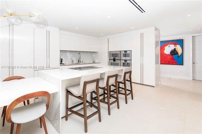 Building Photo - 10201 Collins Ave