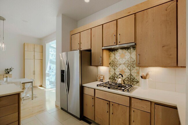 Building Photo - Gorgeous 4 Bedroom Home in NW Indian Peaks Neighborhood. Hardwood floors, Wine Closet and More